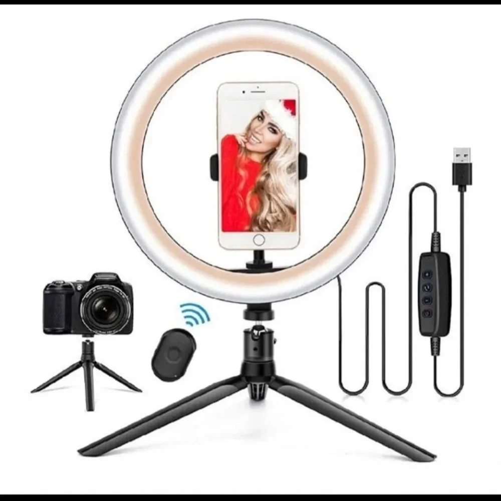 Brand new Ring light with tripod and 3 setting lighting fixture.
